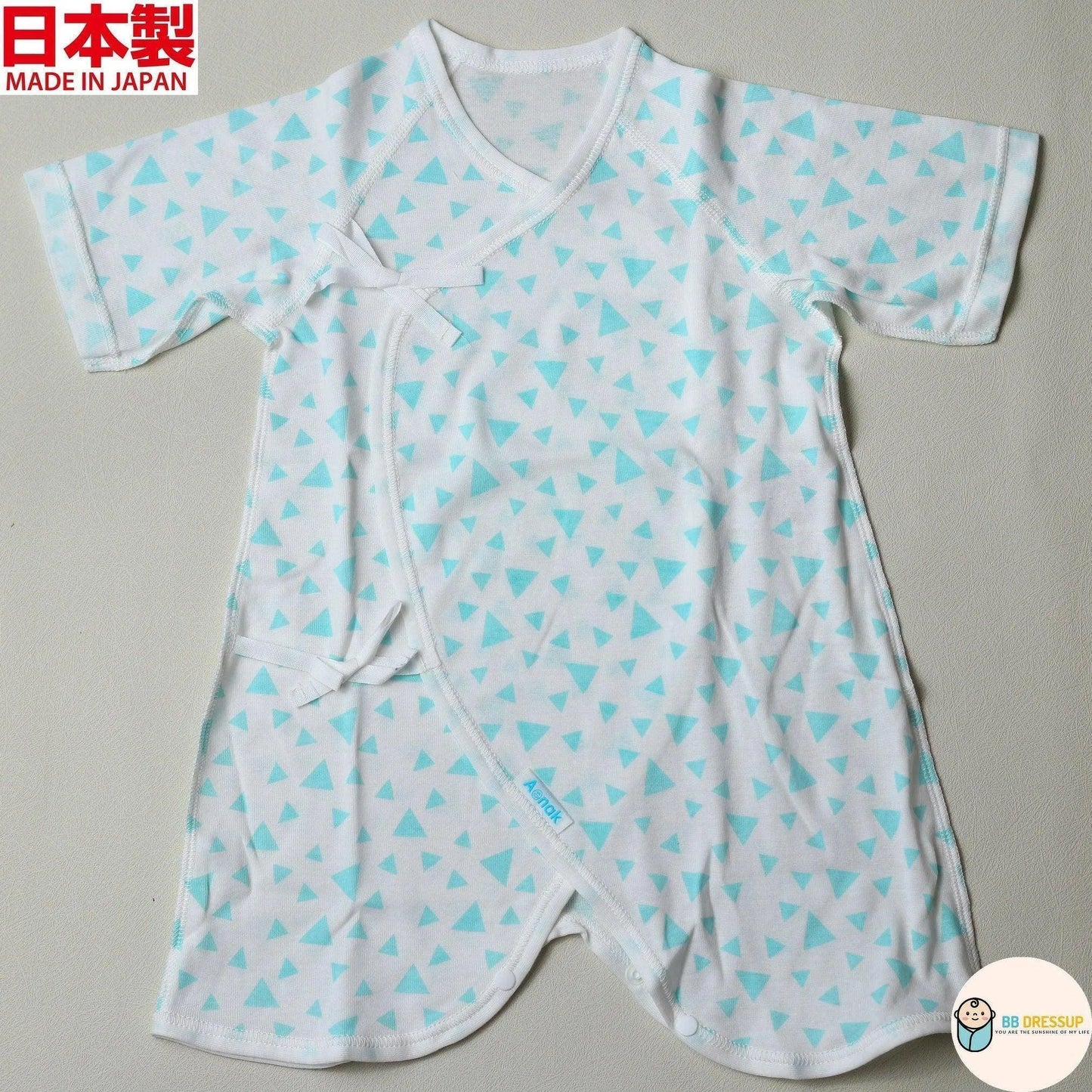 採用100%全棉材質製成之高品質嬰兒連身內衣。